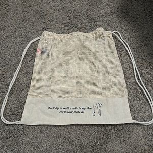 Leed’s cream color dance drawstring bag!